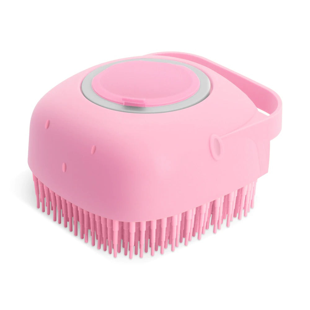 Pink pet shampoo massager brush with circular top and dense bristles