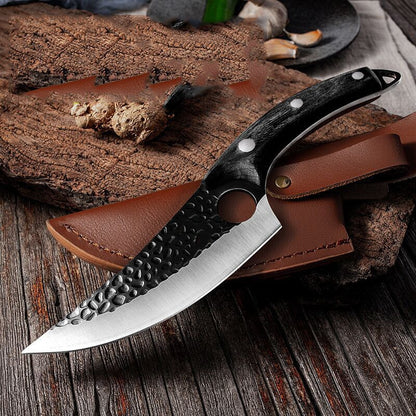 Boning and scimitar knife with dark handle and textured grip, with brown leather sheath