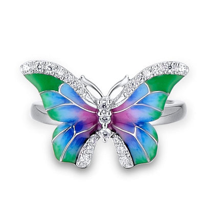 Butterfly enamel ring with openwork wings and clear crystal accents on silver tone