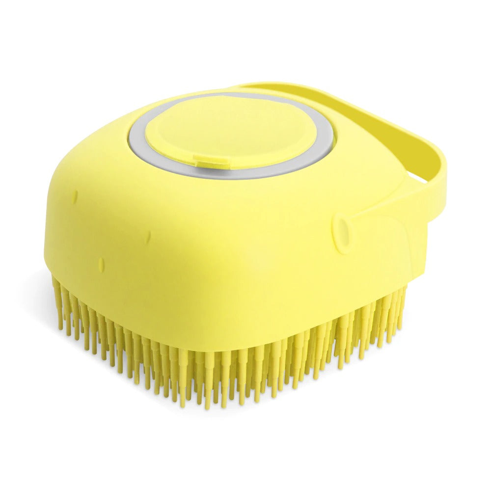 Yellow pet shampoo massager brush with round button and flexible bristles