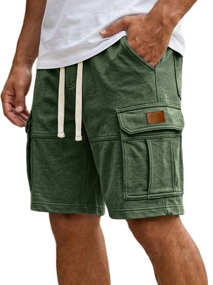 Men's cargo shorts in dark green, side cargo pockets and flap pocket detail
